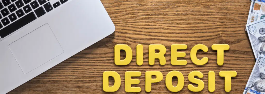 Title loans online direct deposit close to a laptop.