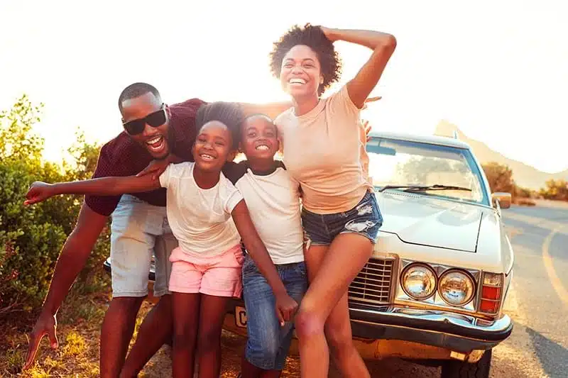 A happy family ready to get their car title loans.